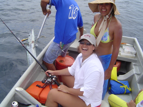 Jenny Henriquez and Mara Goldner storm lure and Wahoo catch.